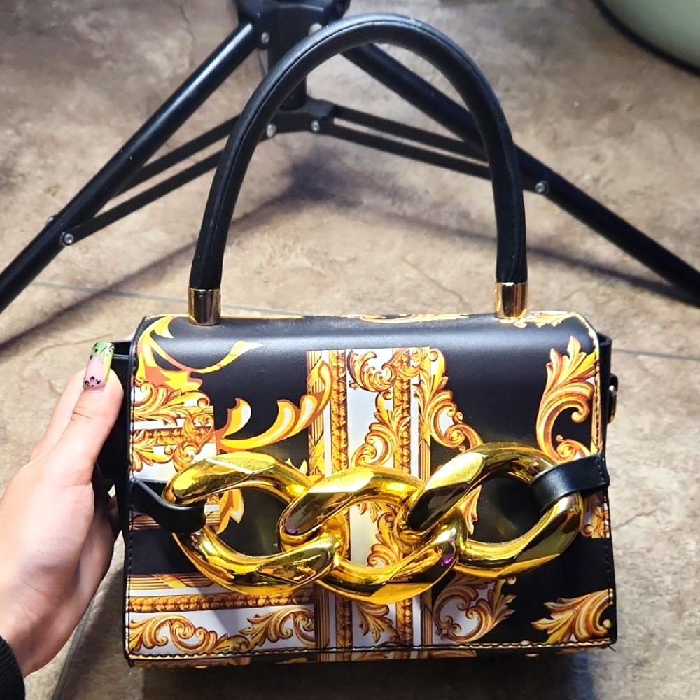 Elegant Black and Gold Women's Handbag